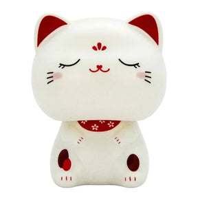 Lyckokatt Wobble Head - Stängda Ögon